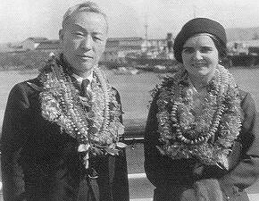 Syngman Rhee and Francesca Donner wearing flower garlands