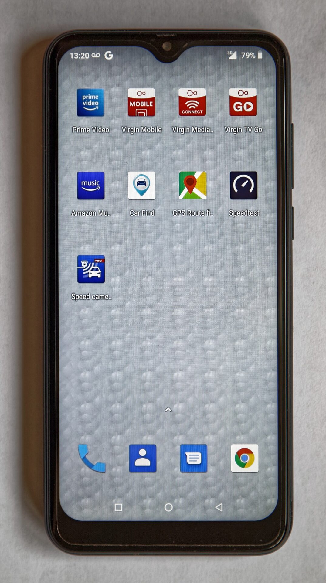 A smartphone home screen with several apps
