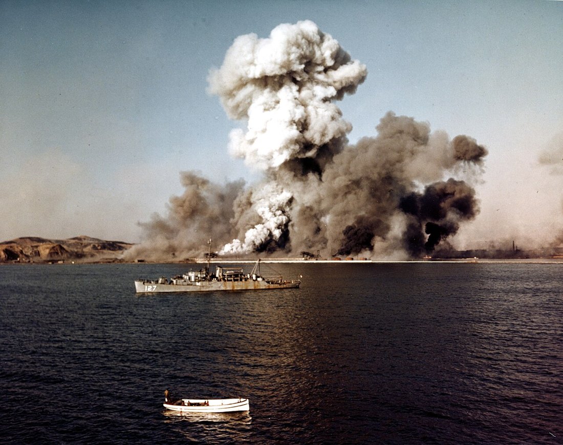 Hungnam, December 24, 1950. After all refugees and troops were evacuated, the port facilities are blown up — the final scene of the Hungnam evacuation.