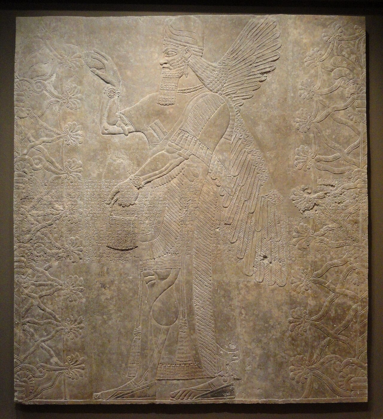 A 'sacred tree' relief from an ancient Assyrian palace (Ashurnasirpal II) — a tree that symbolized life in the ancient Near East.
