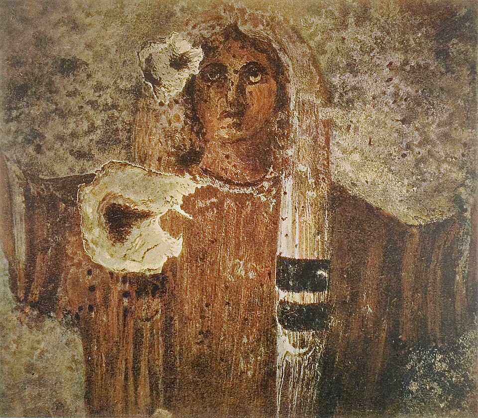 A fresco of an Orans, a figure at prayer, preserved in the Roman catacombs