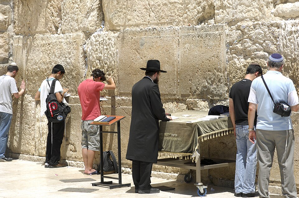 People praying at the Western Wall in Jerusalem