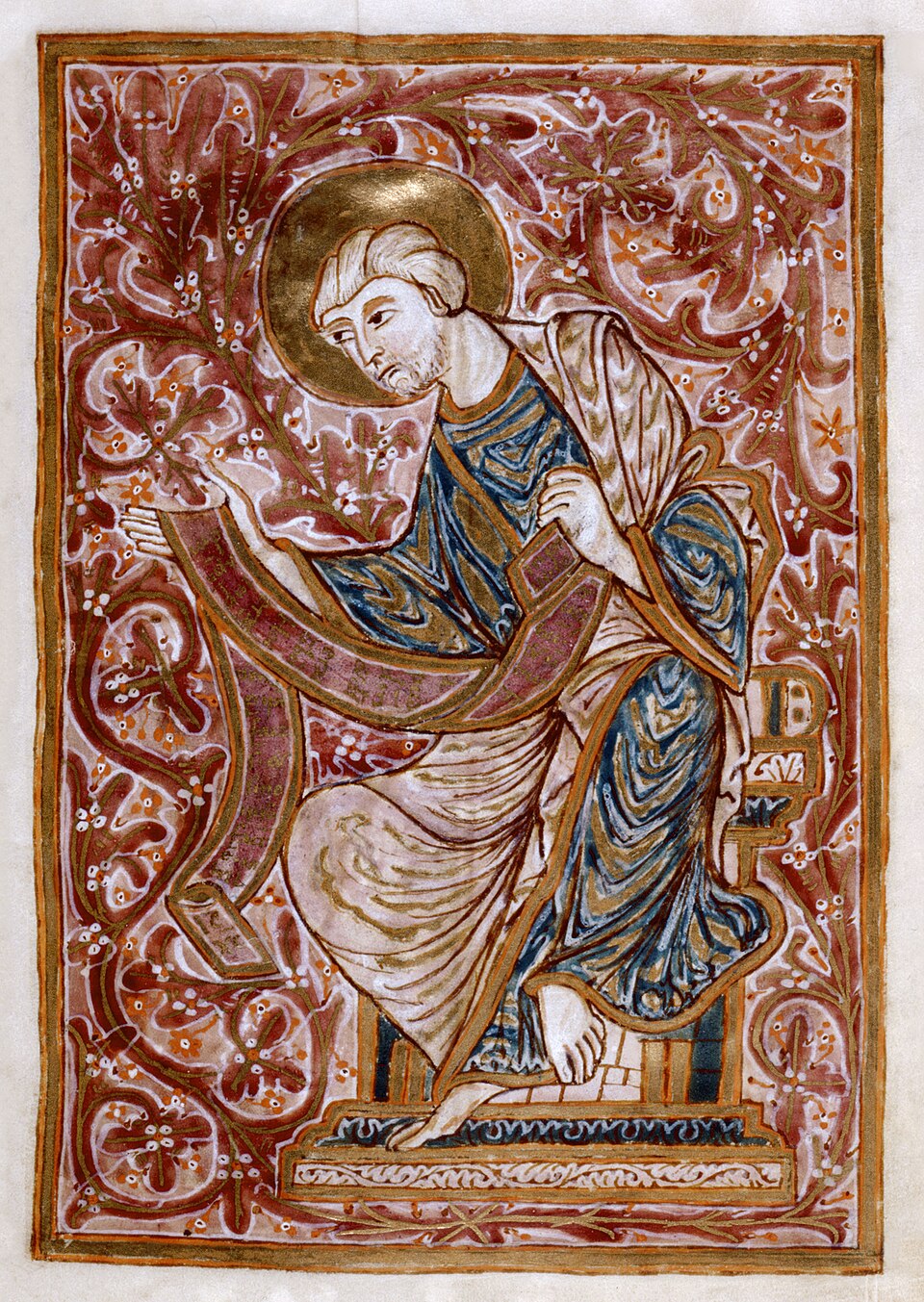 Full-page portrait of John the Evangelist in a medieval Gospel manuscript