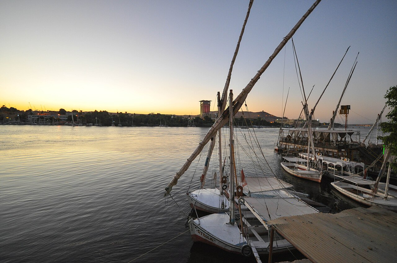 Felucca sailboats on the Nile River at sunset