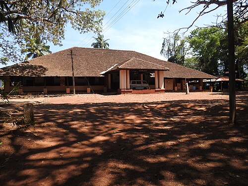 Photograph of a traditional tile-roofed missionary bungalow in Kerala, India