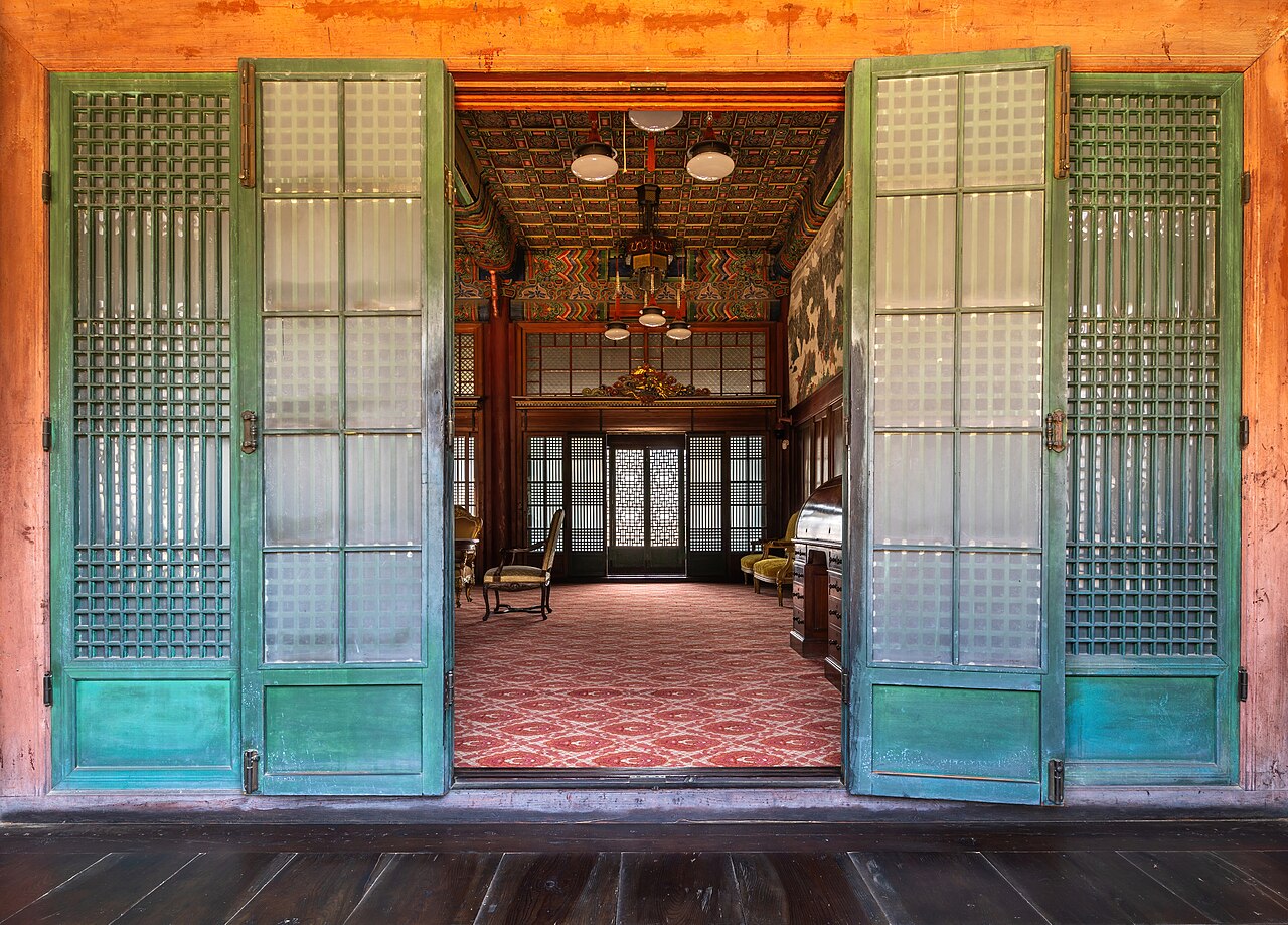 Open doors at Huijeongdang Hall in Changdeokgung Palace, Seoul. This modern photograph serves as a visual reminder to pray for opportunities to share the gospel.