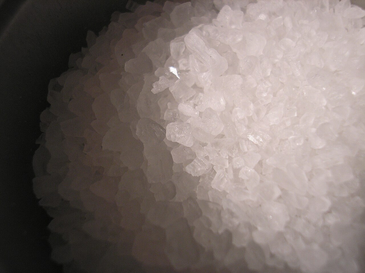 A close-up photograph of salt crystals, inviting reflection on the image of speech seasoned with salt in Colossians.