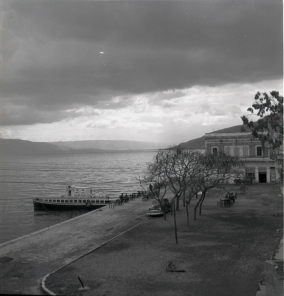 Black-and-white photograph of the Sea of Galilee and the Tiberias waterfront