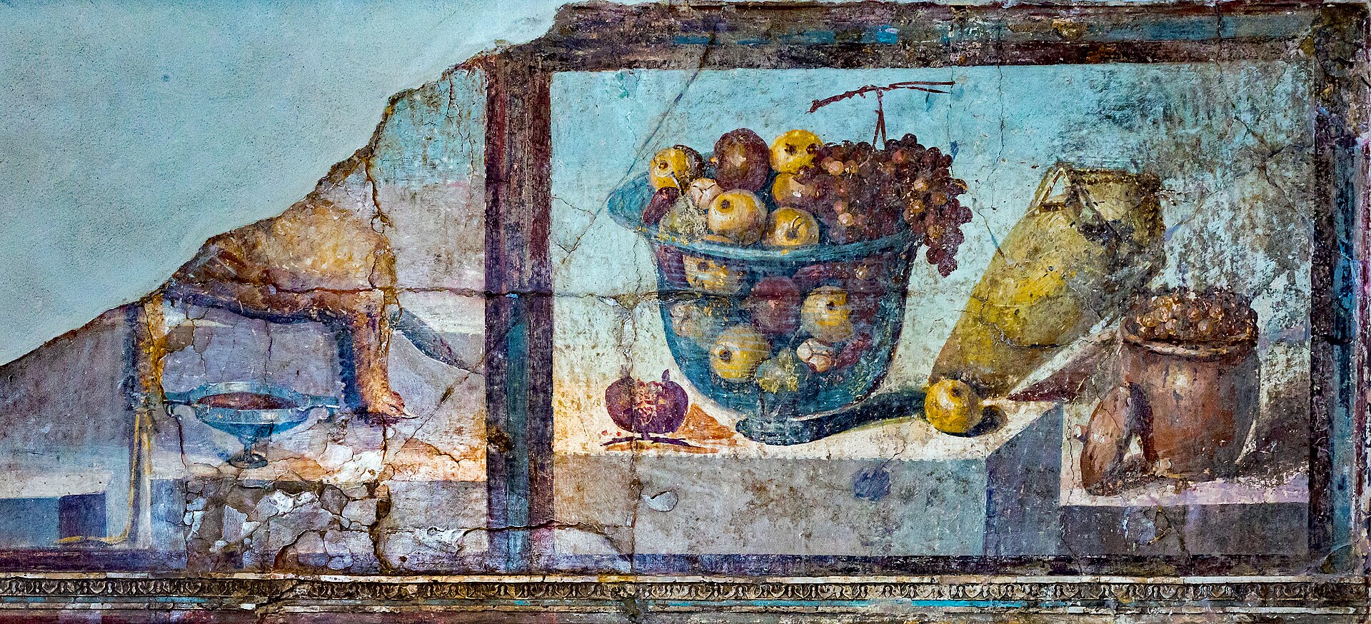 Wall painting from the estate of Julia Felix in Pompeii — a still life with a glass bowl of apples and grapes, a jar and a pomegranate